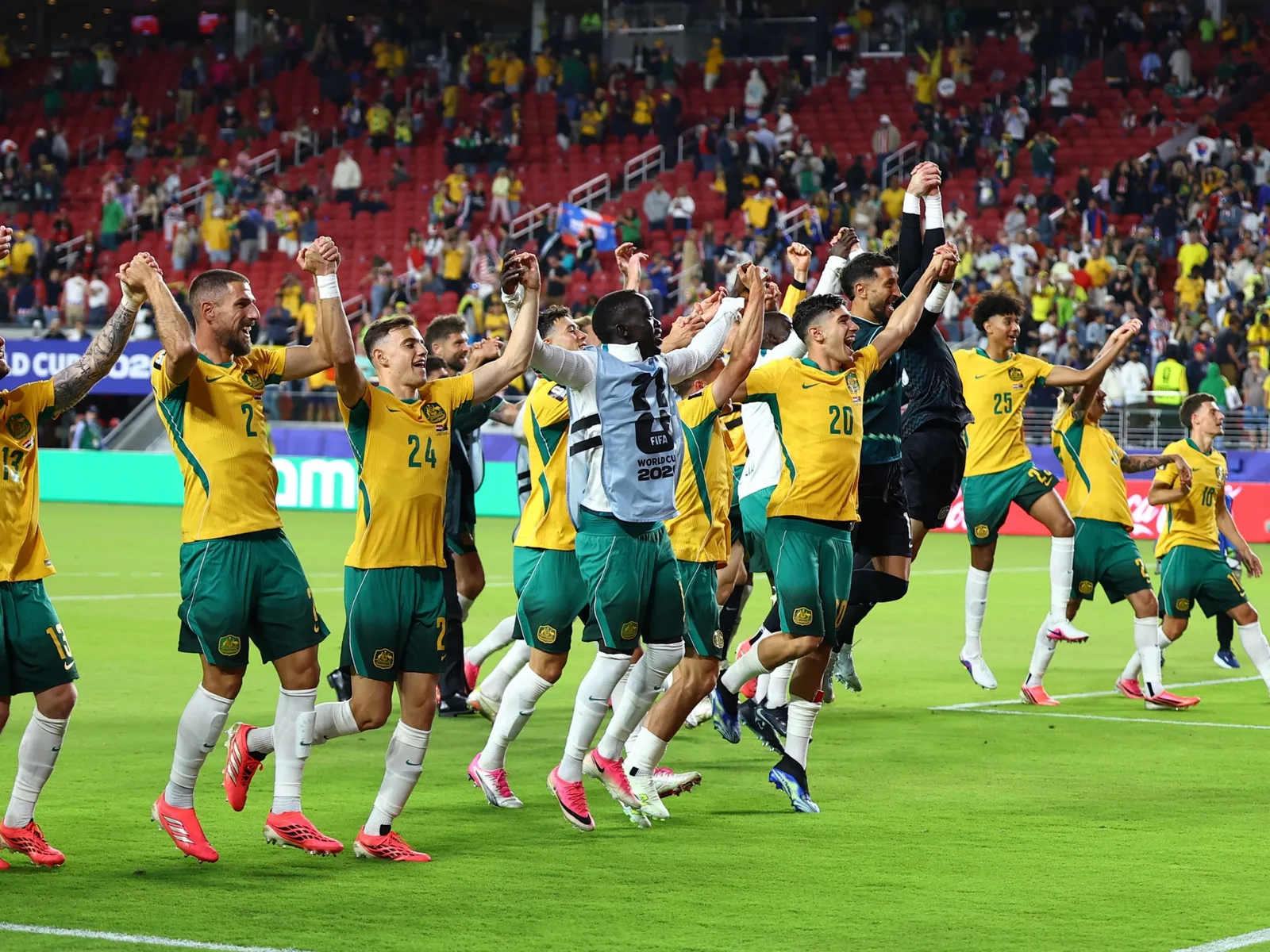 Socceroos secure place in World Cup last 32 after nerve-shredding draw with Paraguay